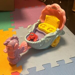 Working Disney Ariel fisher price carriage